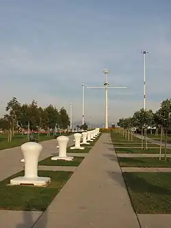 Middle Harbor Shoreline Park, with the mast of USS&nbsp;Oakland in the distance.