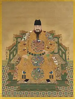 A portrait of the Chenghua Emperor seated on his throne