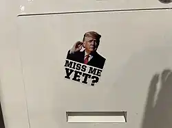 Sticker art expressing support for Donald Trump, using the slogan "Miss Me Yet?", on an order kiosk in a McDonald's branch in Washington, D.C.