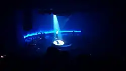 Mitski performing in the theatre in 2024