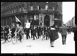 Group of demonstrators with flags.
