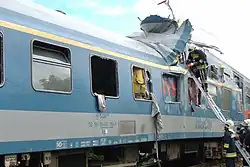 Photo of emergency personnel rescue passengers after the Monorierdő train collision