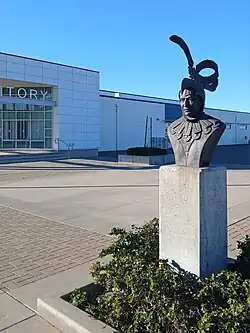 Aztec bust & newer basketball gym