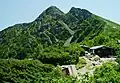 Shiomi Mountain hut and Mount Shiomi (seen from west)
