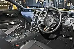 A car with black interior in right-hand form.