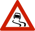Slippery road Road is known to be especially slippery under special conditions, like rainfall.