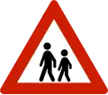 Children[N 2] Warns that children often traverse or walk on the roads due to a nearby school, child-care center, playground or similar.