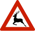 Animals (deer) Warns that deer often traverse or travel on the roads.