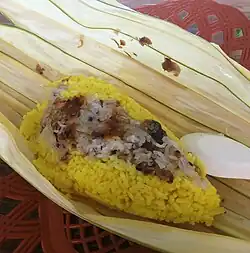 Manado nasi kuning wrapped in woka leaf