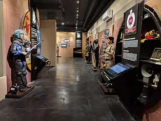 Museum exhibit, with uniformed mannequins