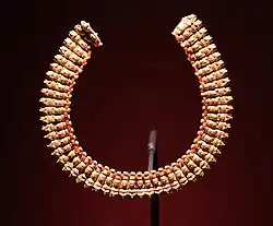 Necklace made of gold pendants with a small carnelian bead between each. Meroitic period.