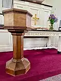 Baptismal font, altar, and pulpit