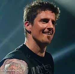 Adair playing with Nickelback in 2011
