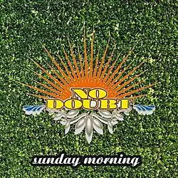 A grass covered background is fronted by a brightly designed No Doubt logo with the title of the song below.