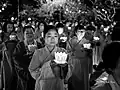 Buddhists and monks prepare to water lanterns on the occasion of Vu Lan