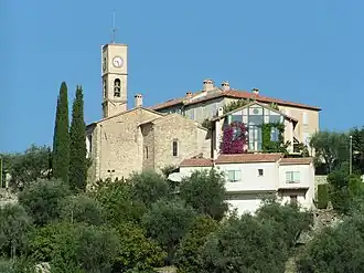 A view of the church and surrounding buildings in Opio