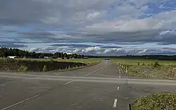 Kortbana (short runway) at former Optand wartime air base, Sweden. Notice the road becoming wider.