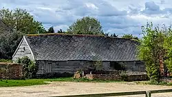 Outbuilding with horse engine shed foundation