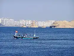 A scene of boat near the Oyster Rocks