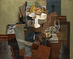 Pablo Picasso, 1914–15, Nature morte au compotier (Still Life with Compote and Glass), oil on canvas, 63.5 × 78.7 cm (25 × 31 in), Columbus Museum of Art, Ohio