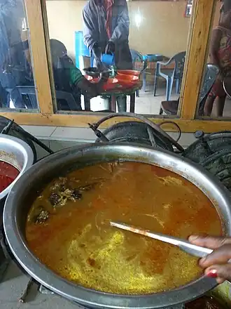 Palm nut soup in a chop bar
