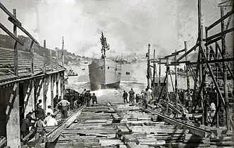 Launch of a boat at a shipyard in Pasaia, Gipuzkoa (1920)