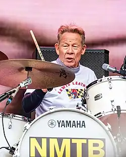 Cook performing with Sex Pistols and Frank Carter in 2025