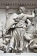 Hecate on a frieze, robed and holding a shield