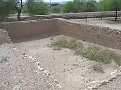 These rooms were large and had eight foot walls. Artifacts were kept in them.