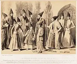 Abbas Mirza Molk-Ara Nayeb-al-saltana in his childhood with his tutor, Reza-Qoli Khan Hedayat, Haji Mirza Aqasi, the grand vizier and Mirza Abolhassan Khan Ilchi; Published in 1850[12]