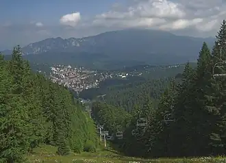 View of Predeal from Clăbucet-plecare Chalet (1,445m);[1] behind is the Postăvarul massif