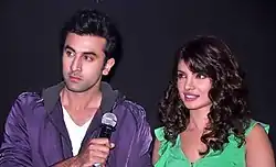 A photograph of Ranbir Kapoor and Priyanka Chopra looking from the camera
