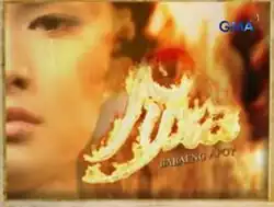 An image of Thea Tolentino, with tears on her right eye and a fire on the background. The series title is displayed on the center of the image. The logo of GMA Network is displayed on the upper right side of the image.