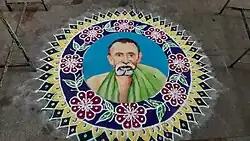 Colourful, decorated portrait of Swamigal