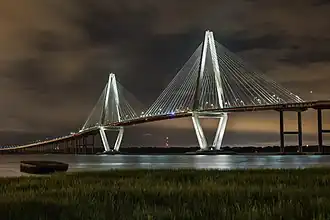 Image 4The Arthur Ravenel Jr. Bridge is a cable-stayed bridge over the Cooper River in South Carolina, USA, connecting downtown Charleston to Mount Pleasant. It was designed by Parsons Brinckerhoff, a multinational engineering and design firm with approximately 14,000 employees.