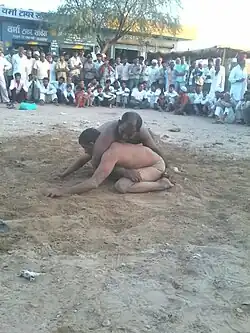 Ground fighting in Indian wrestling.