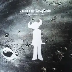 A white silhouette of a human male with buffalo horns, his head slightly tilted to the left. Above him is text of both the band name and album title. The background is a closeup of the moon.