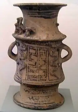 Eschara VI 4563&nbsp;[de], an eschara vessel found in Rhodes, and detailed in Kinch's 1914 work Fouilles de Vroulia (Rhodes). Probably dates to the 8th century BCE due to the late geometric style of pottery. Currently held at the Antikensammlung Berlin.