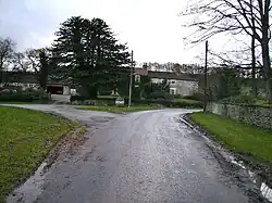 a row of houses, several in stone