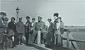 The OTMA sisters together with their parents (the tsar Nicholas II and the empress Alexandra) and some people on a bridge near Mogilev (nowadays in Belarus), where the headquarters of the Russian army were located, summer 1916.