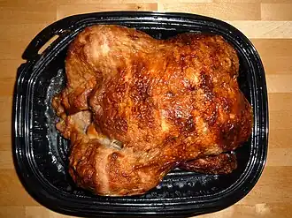 A packaged rotisserie chicken