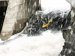 Skilled Kayaker Sadia Loney descending the unobstructed sluiceway of the Laniel Dam
