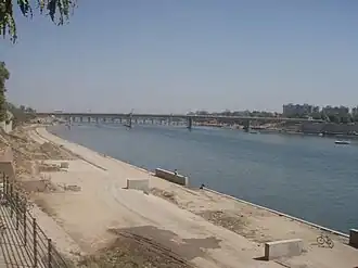 Construction work going on near the river under the Sabarmati River Front Development Project