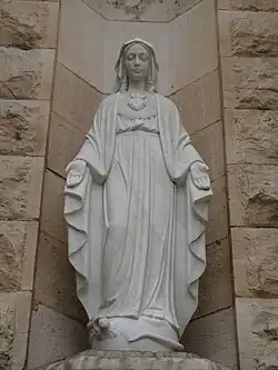 Statue of the Virgin Mary on the façade