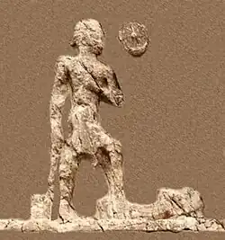 Outline of relief I (extracted). Beardless warrior with axe, trampling a foe. Sundisk above. A name "Zaba(zuna), son of ..." can be read.[14]