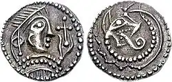 Anglo-Saxon silver sceat, Kent, c. 720. Diademed head, holding cross; reverse, wolf-headed snake.
