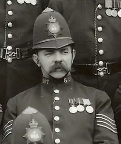 A black and white photo of Green in uniform