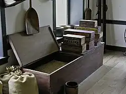 Shaker seeds in a big chest being prepared for placing into envelope "papers" of seed packets