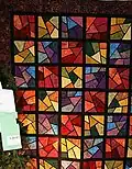 Shattered quilted by Pamela Checketts and Sue's Quilts Shop.