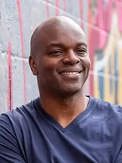 Head-and-shoulders colour photograph of Shaun Bailey in April 2019.